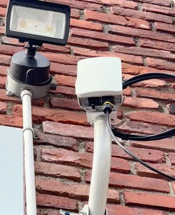 Dual K60 radios on building corner