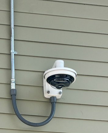 K60 radio on green siding