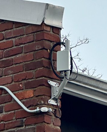 K60 radio on building edge